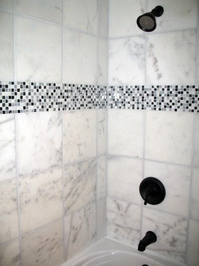 Bianca Carrera polished marble with mosaic